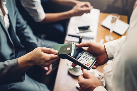 Card being tapped on payment card machine